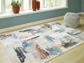 A2Z Furniture - Ashley Furniture - Hessland Rug - 5' x 7' Washable Rug / Multi - R407052